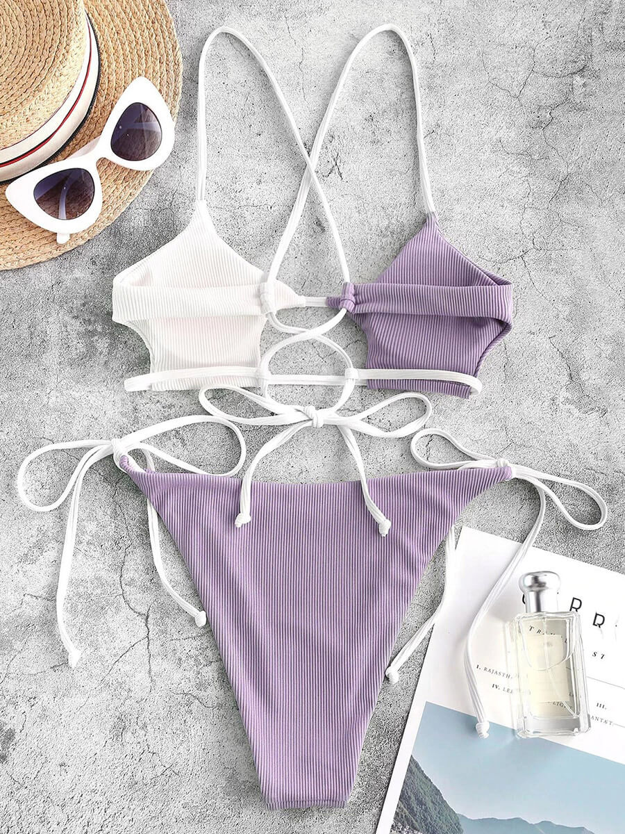 Stylish two-tone string bikini with push-up design, perfect for beach getaways. Features spandex, polyester mix for comfort and elegance.